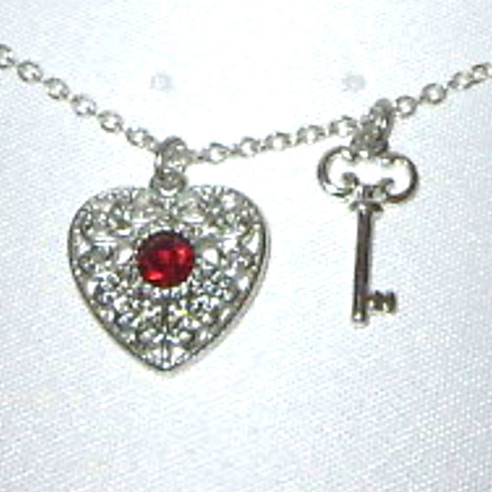 Avon Northwest Territories Silver Heart & Key Necklace